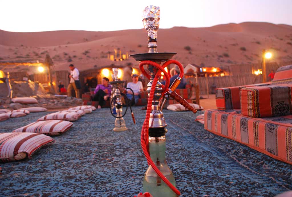 Step into a world of ultimate indulgence at Nujum Camp in Al Ain desert, with our exquisite Shisha Lounge & Evening package