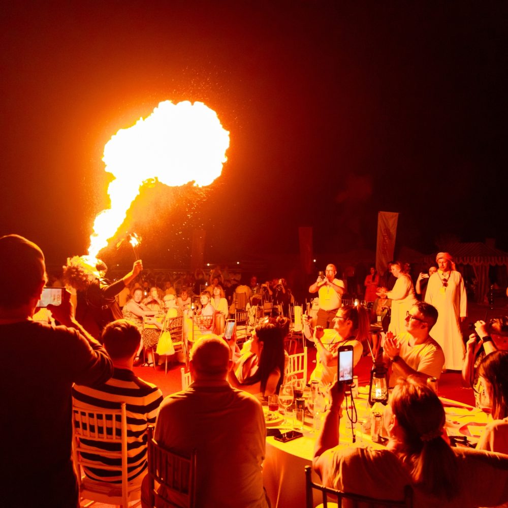 Dancing with the fire at Nujum desert camp, gala dinner