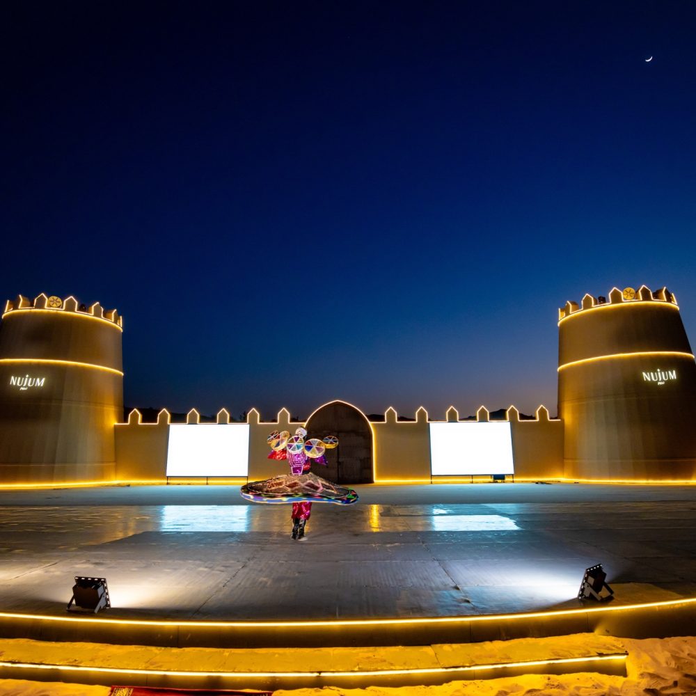 Taniura dancing at Nujum desert camp during dinner